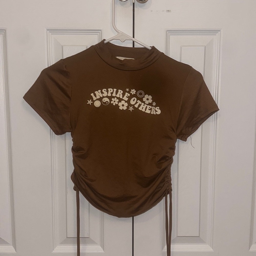 Brown “inspire others” indie top